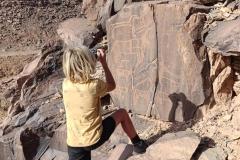 Dax fotografeert rotstekeningen